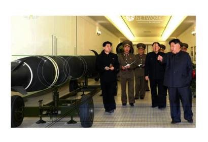 Using the 600 mm multiple rocket launcher round as reference, the face length of both Kim Jong Un and Hong Sung Mu have been measured for later use